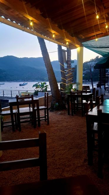 Scenic waterfront pergola dining